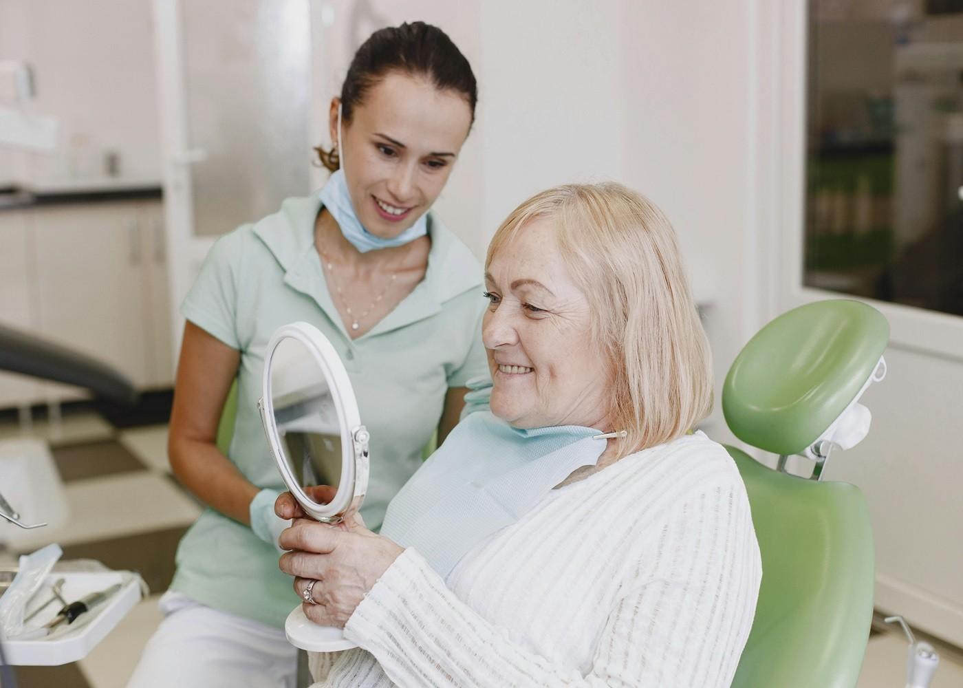 Adapting to Your New Smile With Implant Dentures